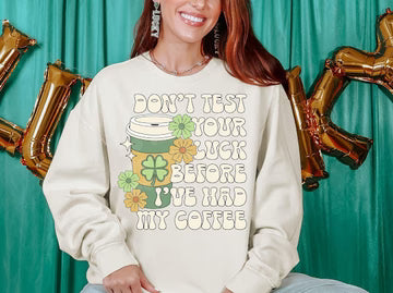 Don't Test Your Luck Before I've Had My Coffee Gildan Unisex Heavy Blend™ Crewneck Sweatshirt Sand