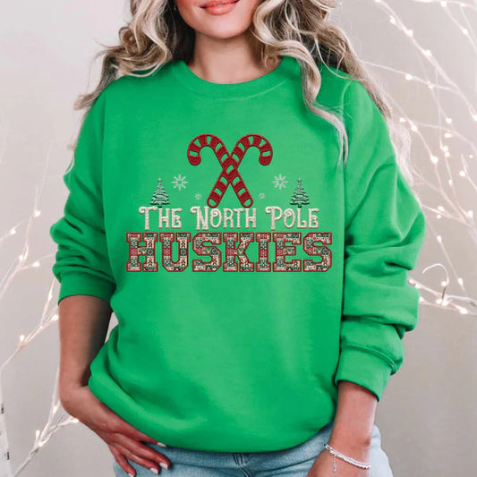 The North Pole Huskies Christmas Gildan Heavy Blend™ 50/50 Fleece Crew Irish